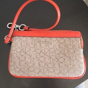 Calvin Klein Red and Tan Monogram Wristlet